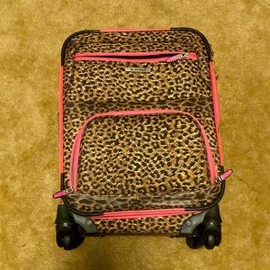 Cheetah print suitcase with pink accents